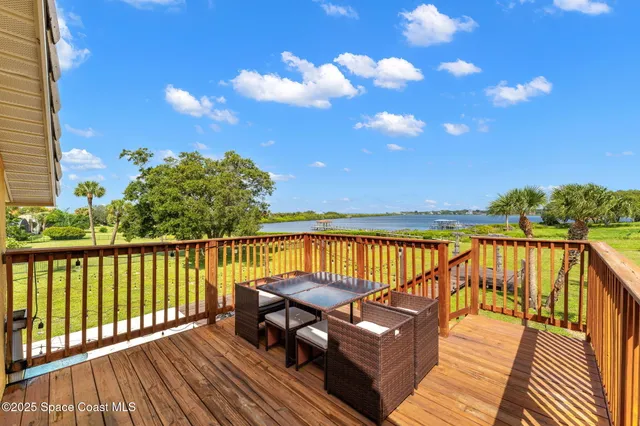 a view of a swimming pool and a porch