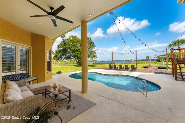 a view of a lake with a big yard