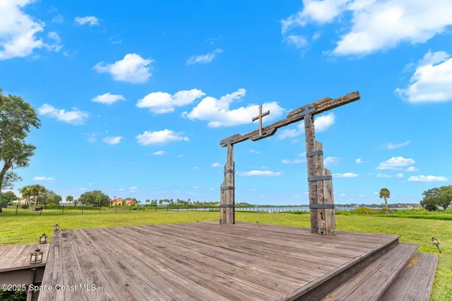 a view of a lake with a yard