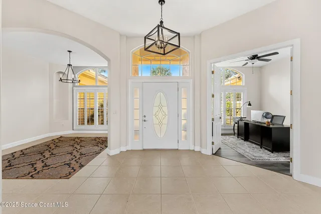 a bedroom with a large bed and dresser