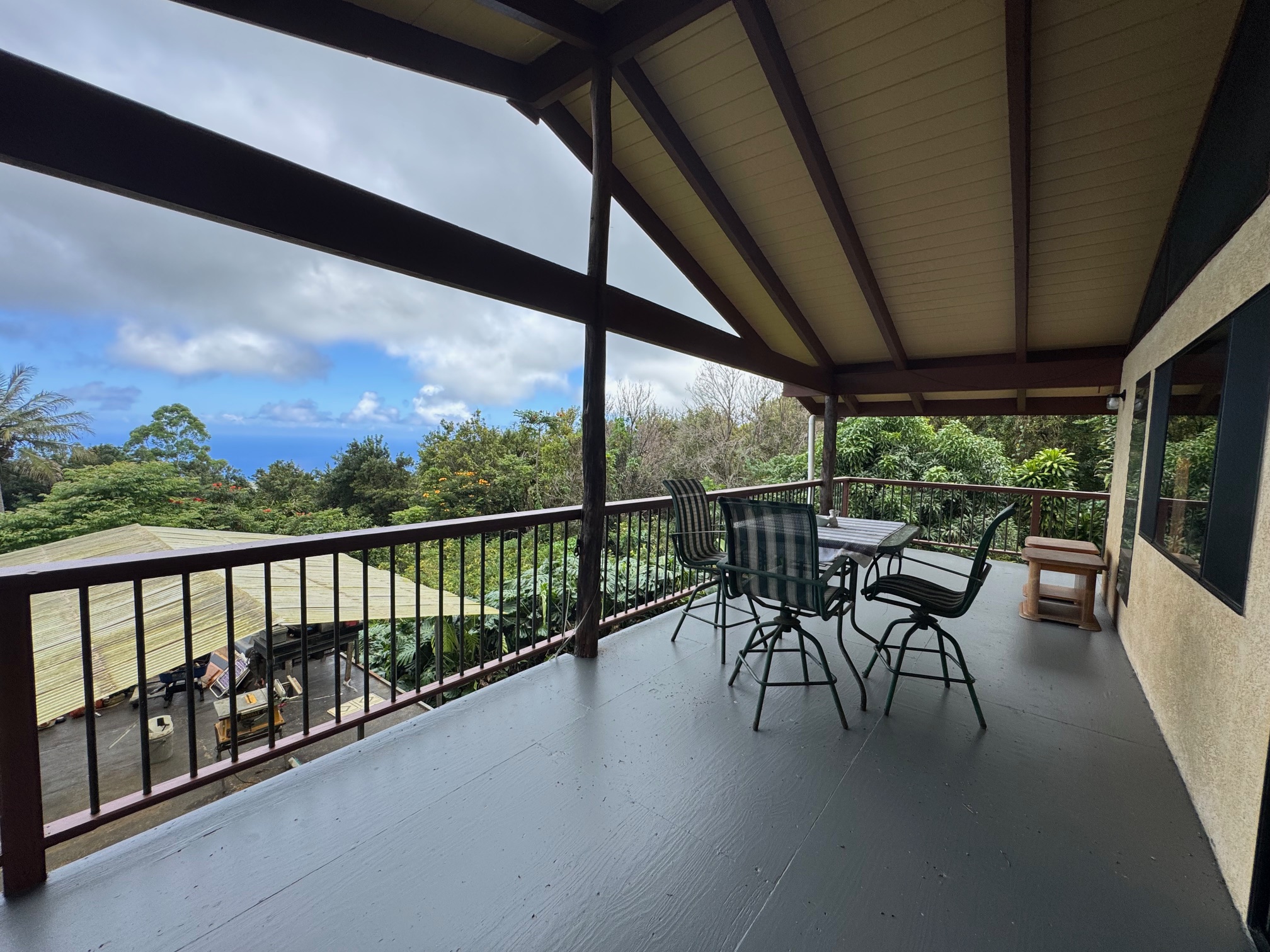 84-1164 Bruner Road Captain Cook, HI 96704 - Photo 3 of 13 a view of a two chairs in the balcony