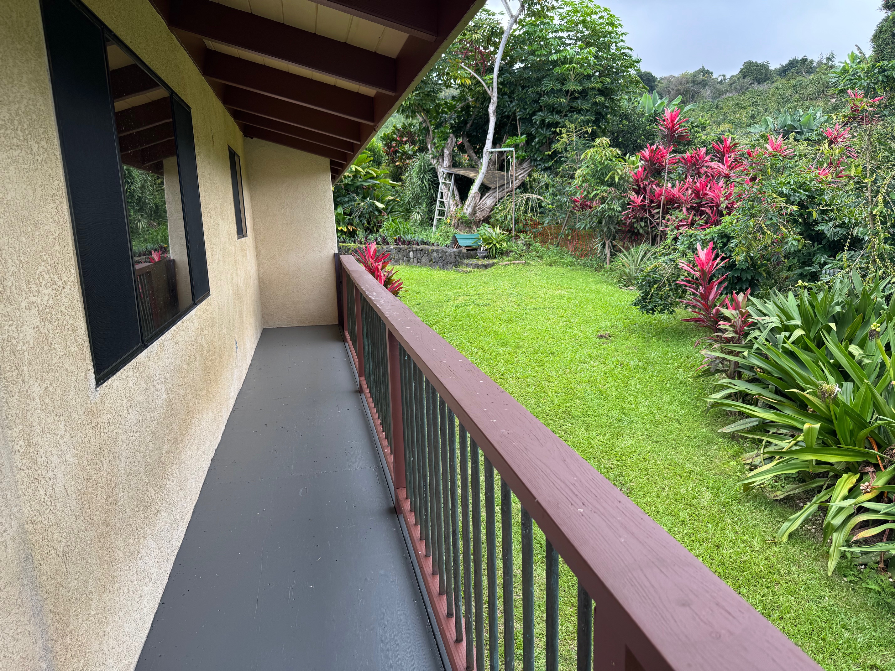 84-1164 Bruner Road Captain Cook, HI 96704 - Photo 4 of 13 a view of a pathway of a house