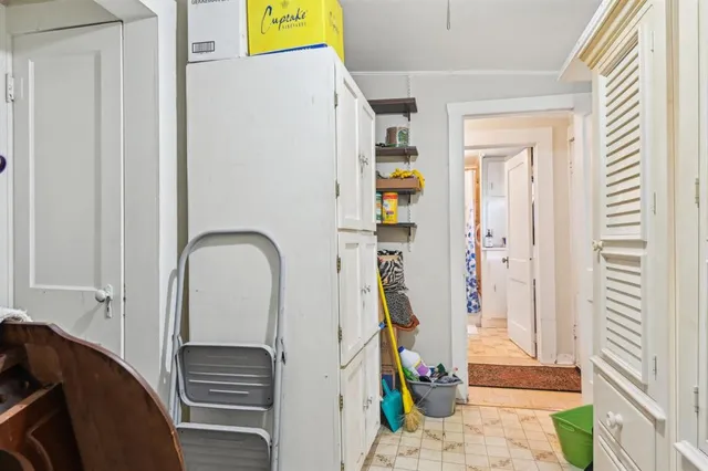 a view of front door and bedroom