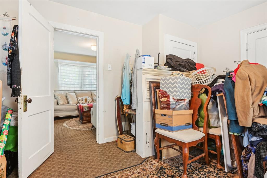 2509 Bird Street Fort Worth, TX 76111 - Photo 19 of 30 a living room with furniture a rug and a window