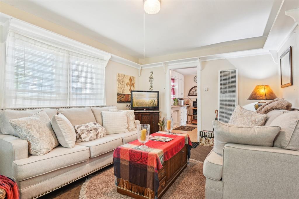 2509 Bird Street Fort Worth, TX 76111 - Photo 4 of 30 a living room with furniture and a window