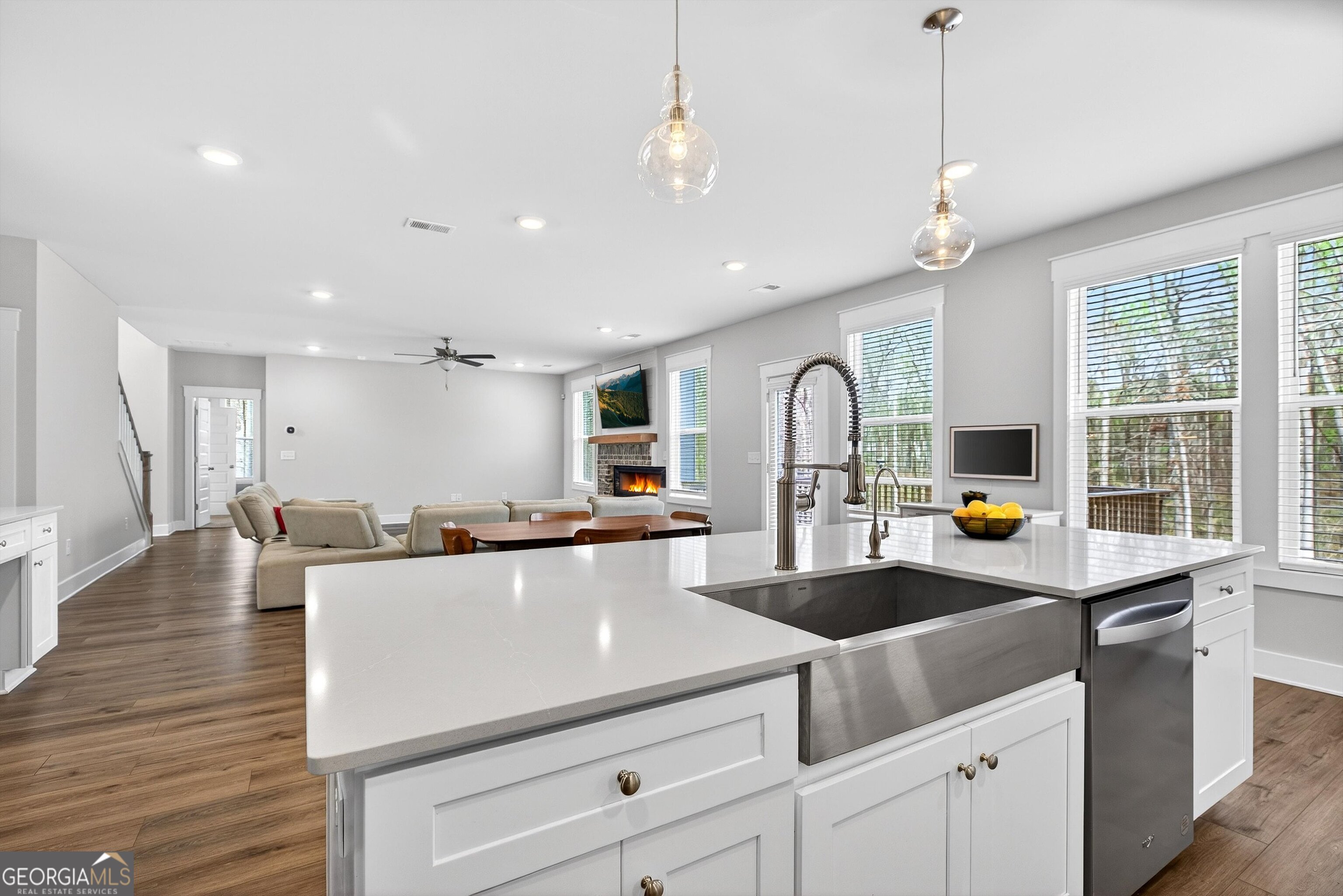 299 Saddleridge Trail Senoia, GA 30276 - Photo 15 of 56 a kitchen with counter space a sink appliances and cabinets