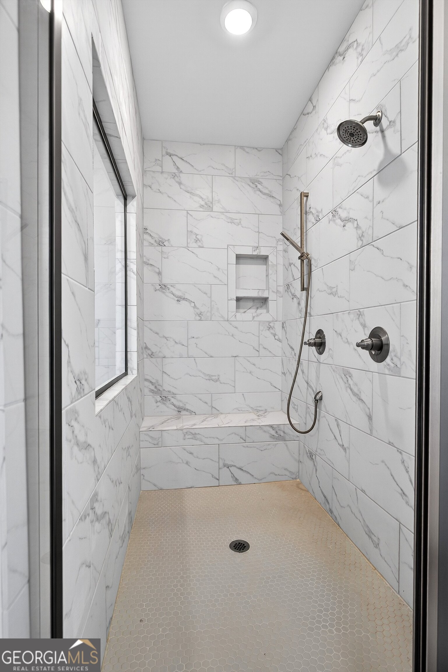 299 Saddleridge Trail Senoia, GA 30276 - Photo 30 of 56 a bathroom with a bath tub