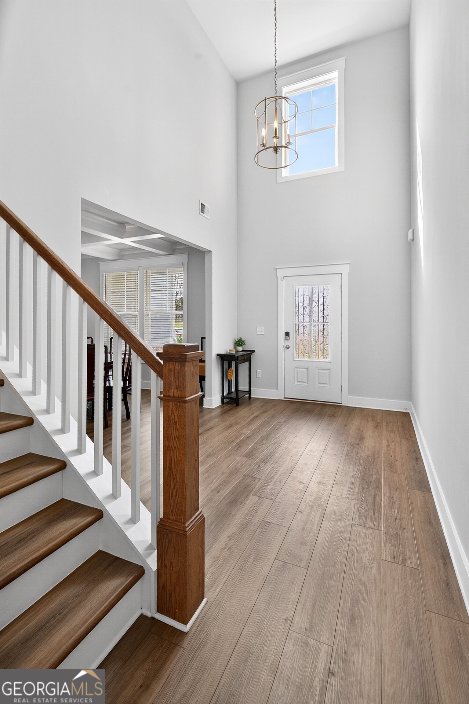 299 Saddleridge Trail Senoia, GA 30276 - Photo 4 of 56 a view of an entryway with wooden floor