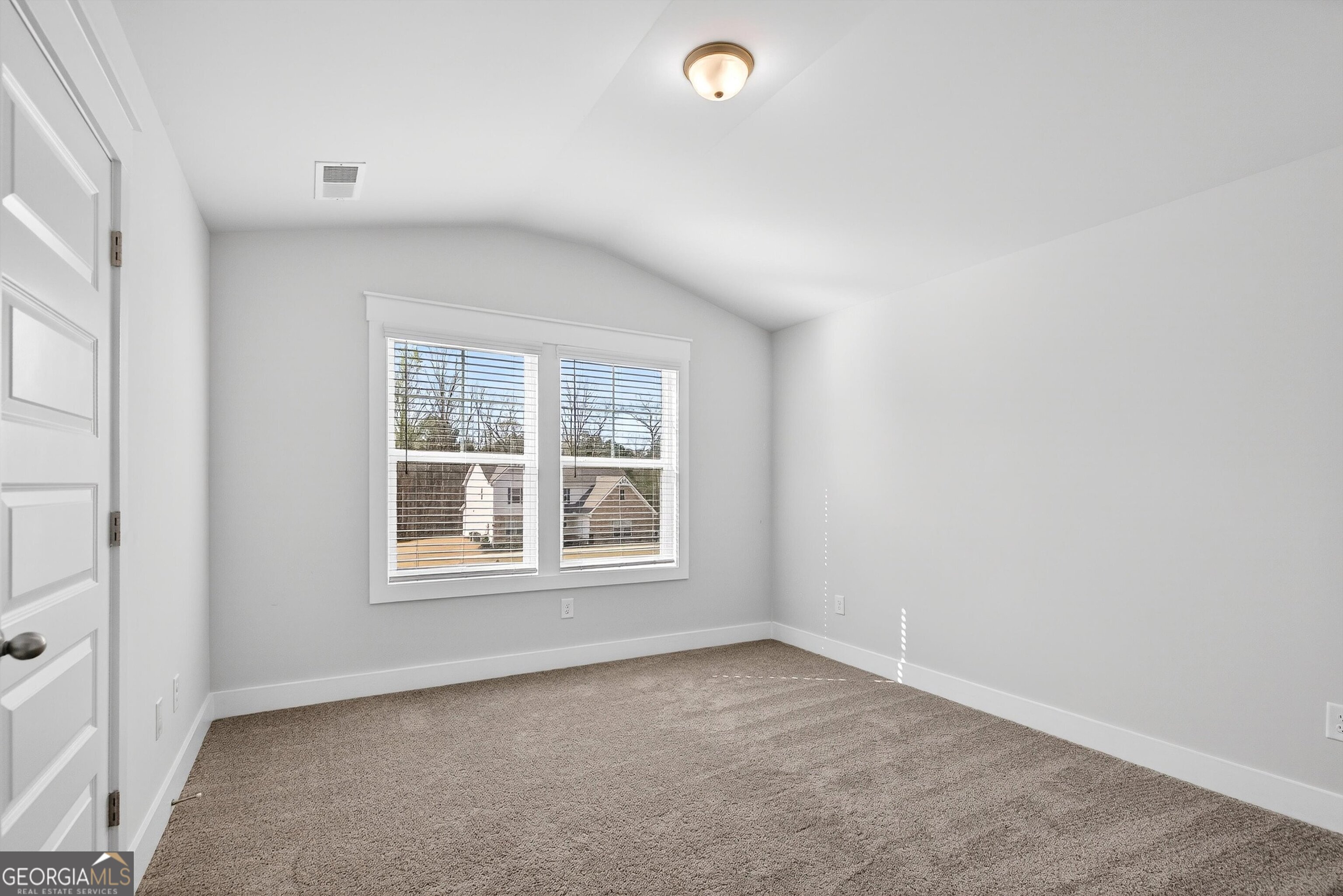299 Saddleridge Trail Senoia, GA 30276 - Photo 42 of 56 an empty room with a window