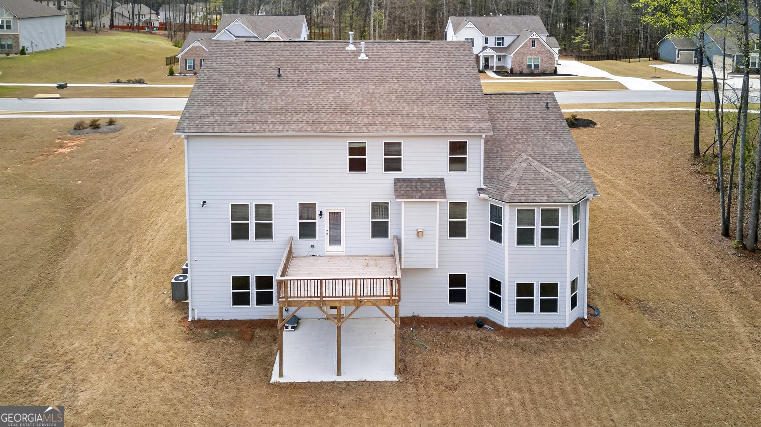 299 Saddleridge Trail Senoia, GA 30276 - Photo 51 of 56 a aerial view of a house with a swimming pool