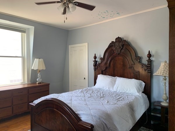 31 South Main Street, Unit 31 Cohasset, MA 02025 - Photo 17 of 30 a bedroom with a bed and a window