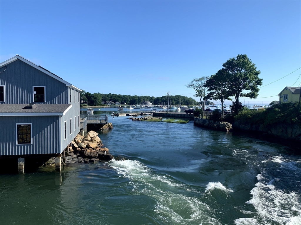 31 South Main Street, Unit 31 Cohasset, MA 02025 - Photo 30 of 30 a wooden deck with lake view