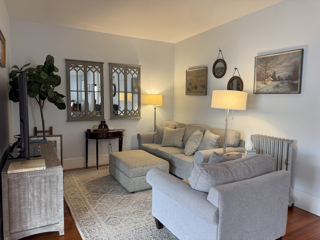31 South Main Street, Unit 31 Cohasset, MA 02025 - Photo 7 of 30 a living room with furniture and a potted plant