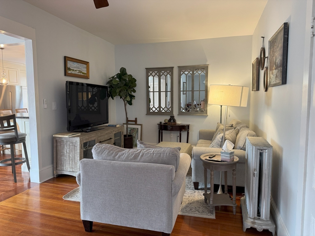 31 South Main Street, Unit 31 Cohasset, MA 02025 - Photo 8 of 30 a living room with furniture and a flat screen tv