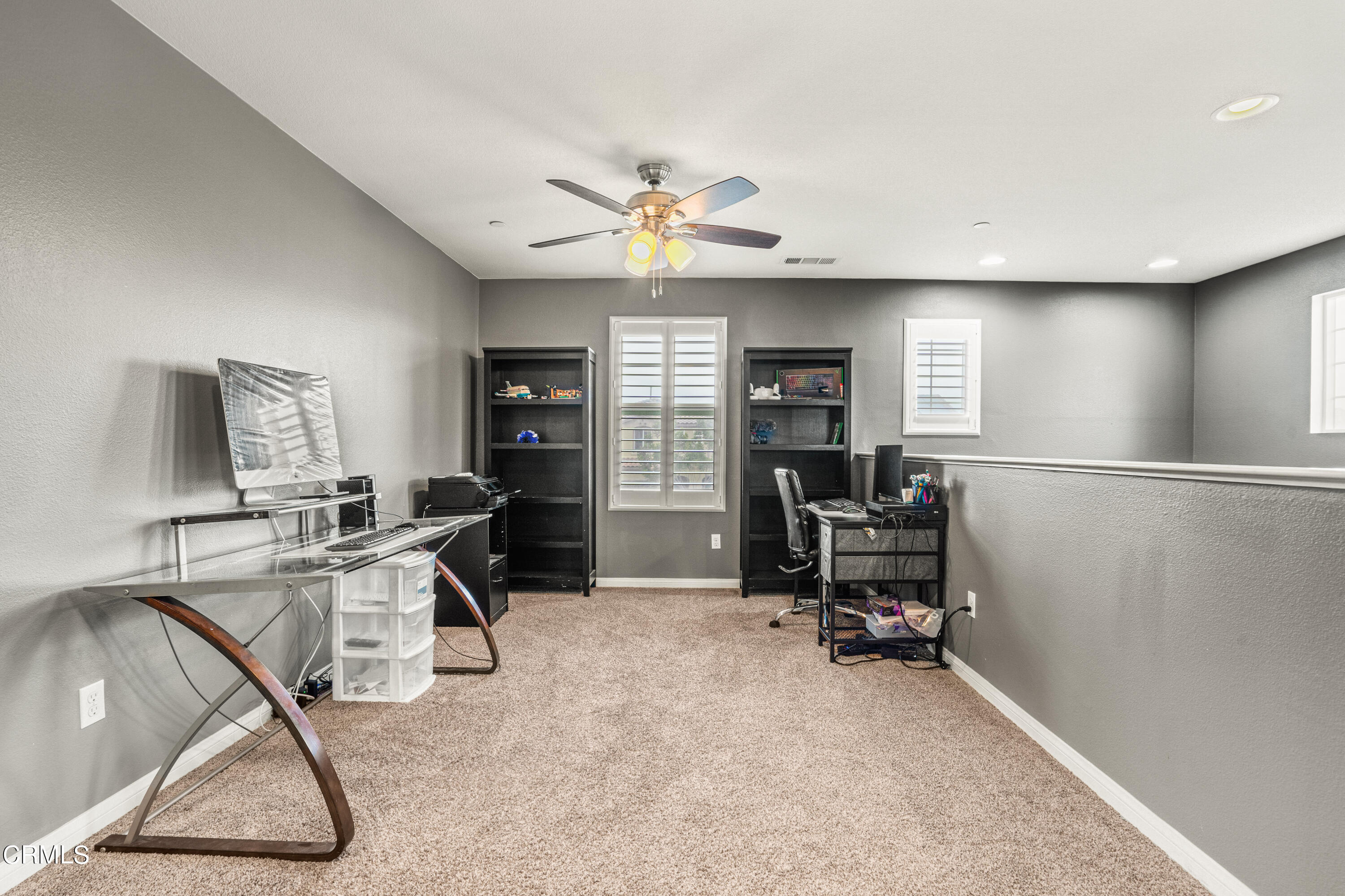 652 Xanadu Way Oxnard, CA 93036 - Photo 30 of 68 a view of a livingroom with workspace and a window