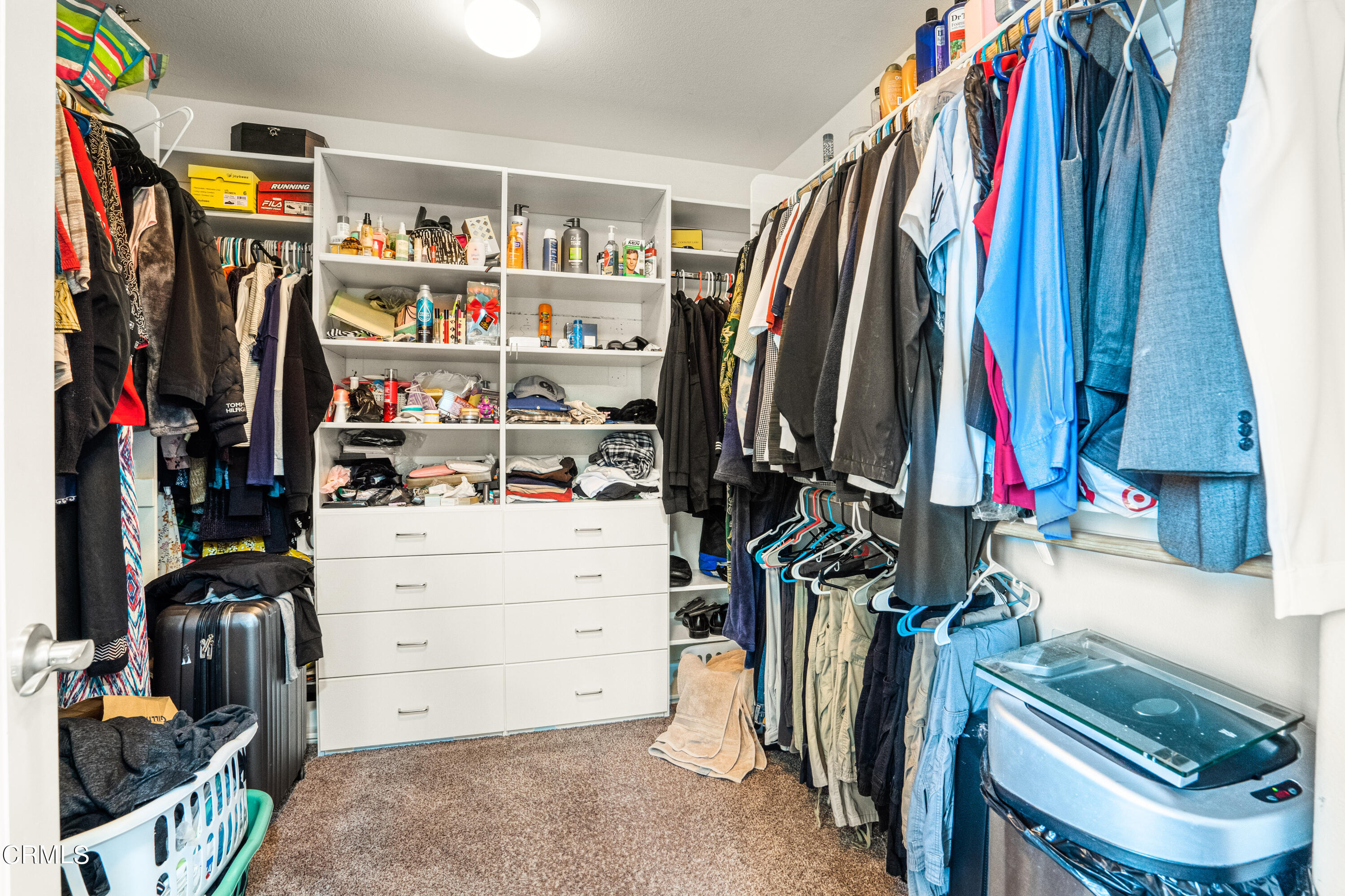 652 Xanadu Way Oxnard, CA 93036 - Photo 33 of 68 a view of walk in closet with clothes