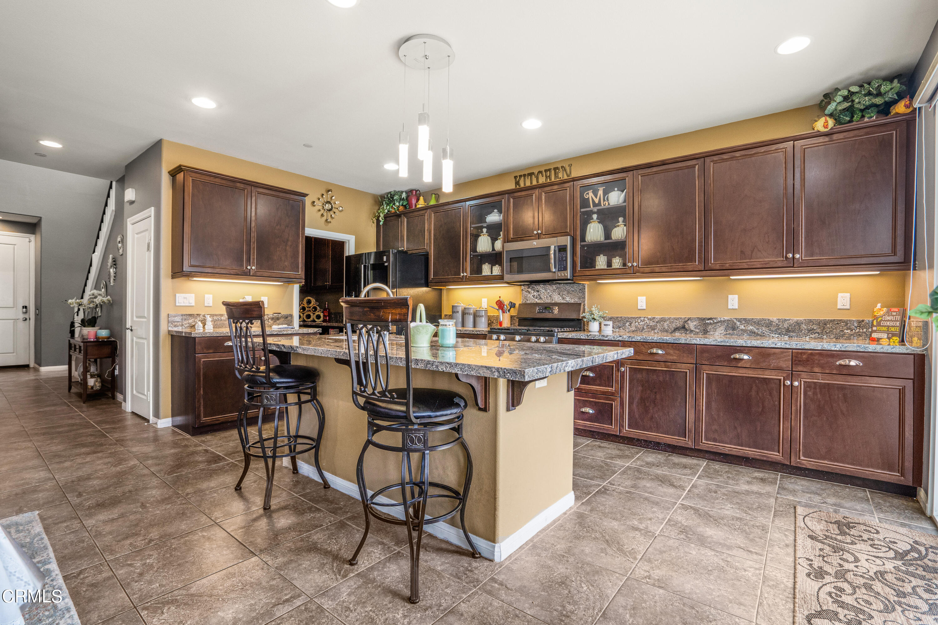 652 Xanadu Way Oxnard, CA 93036 - Photo 39 of 68 a kitchen with a sink and cabinets