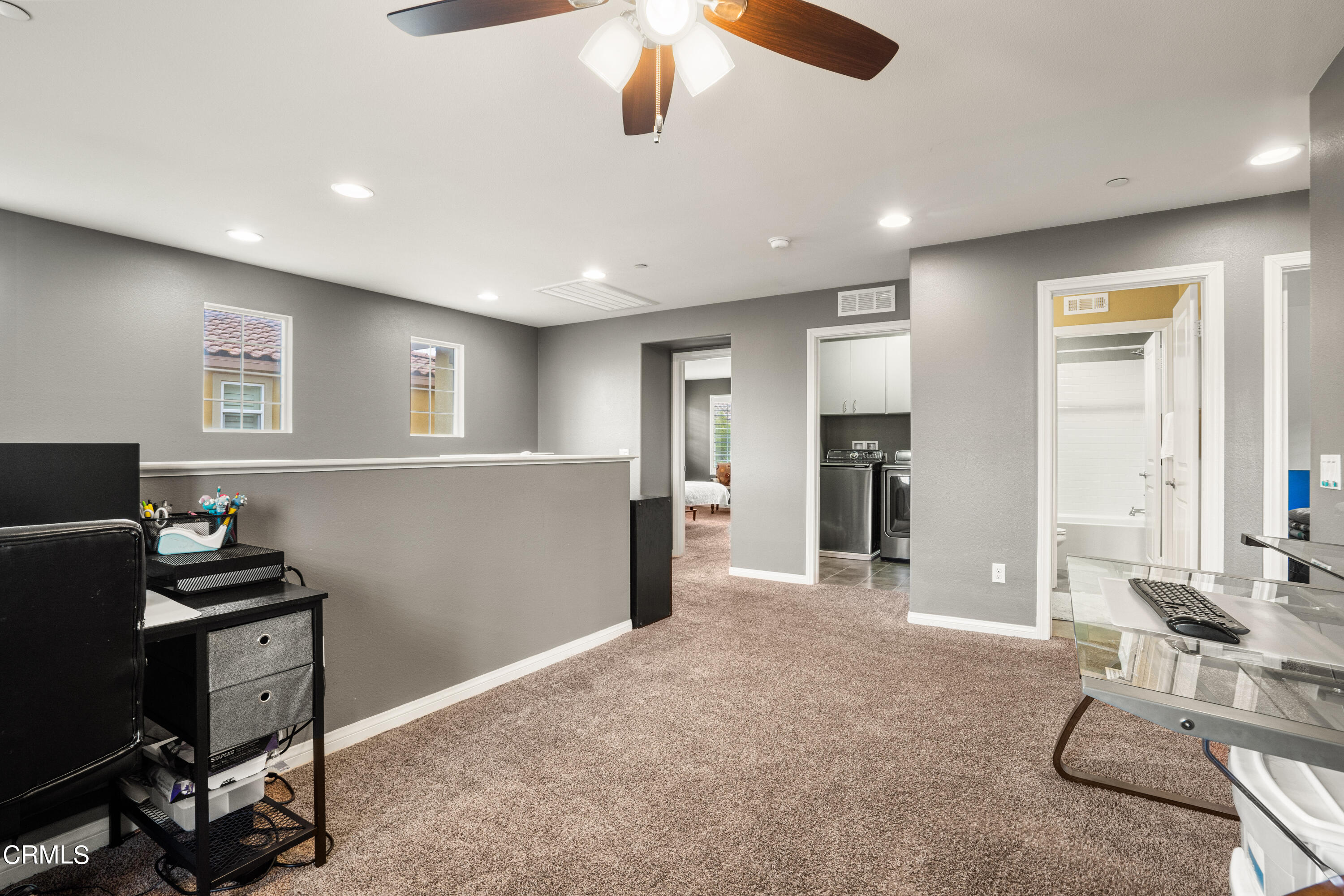 652 Xanadu Way Oxnard, CA 93036 - Photo 42 of 68 a view of a workspace with furniture and a window