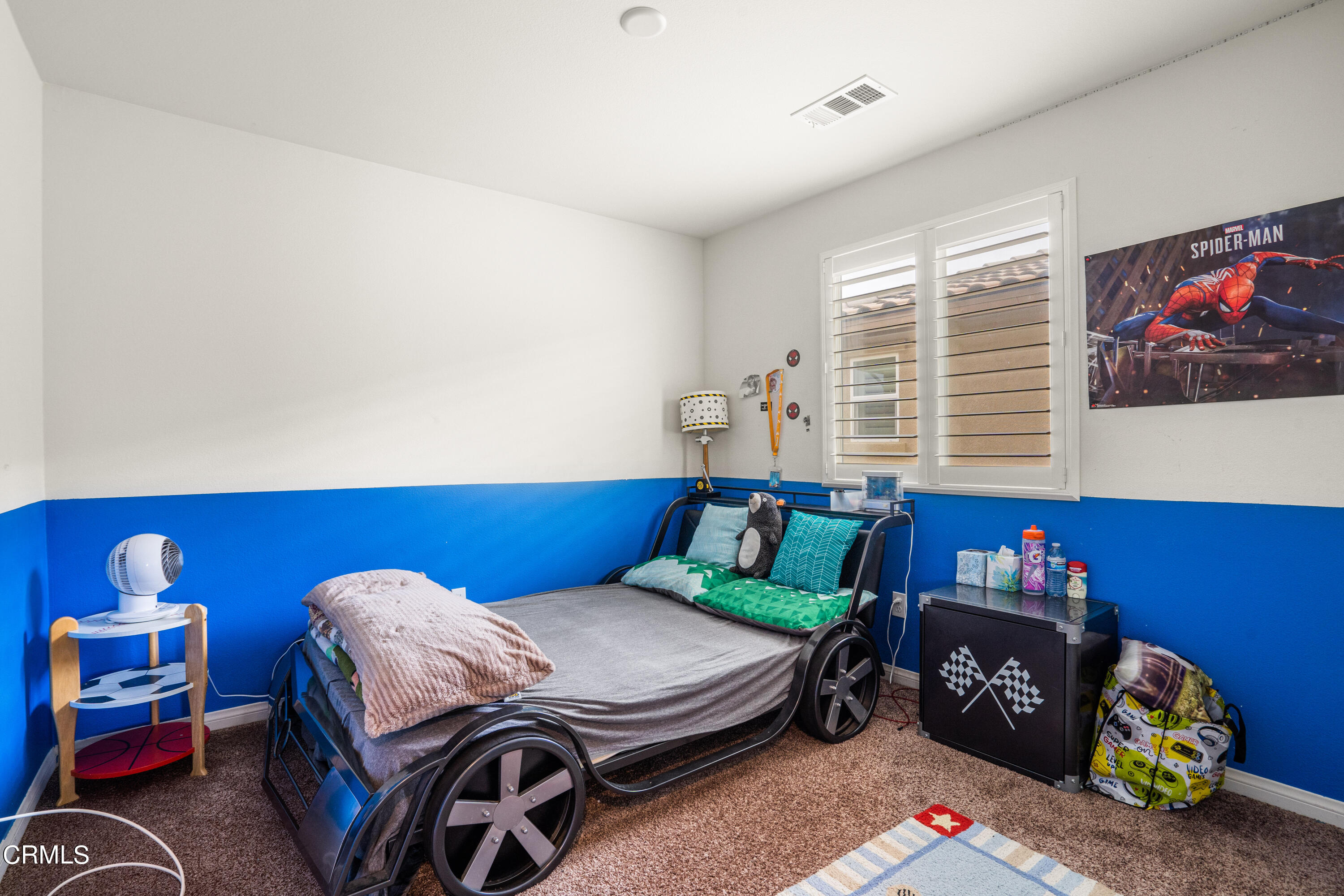 652 Xanadu Way Oxnard, CA 93036 - Photo 43 of 68 a bedroom with a bed and a window