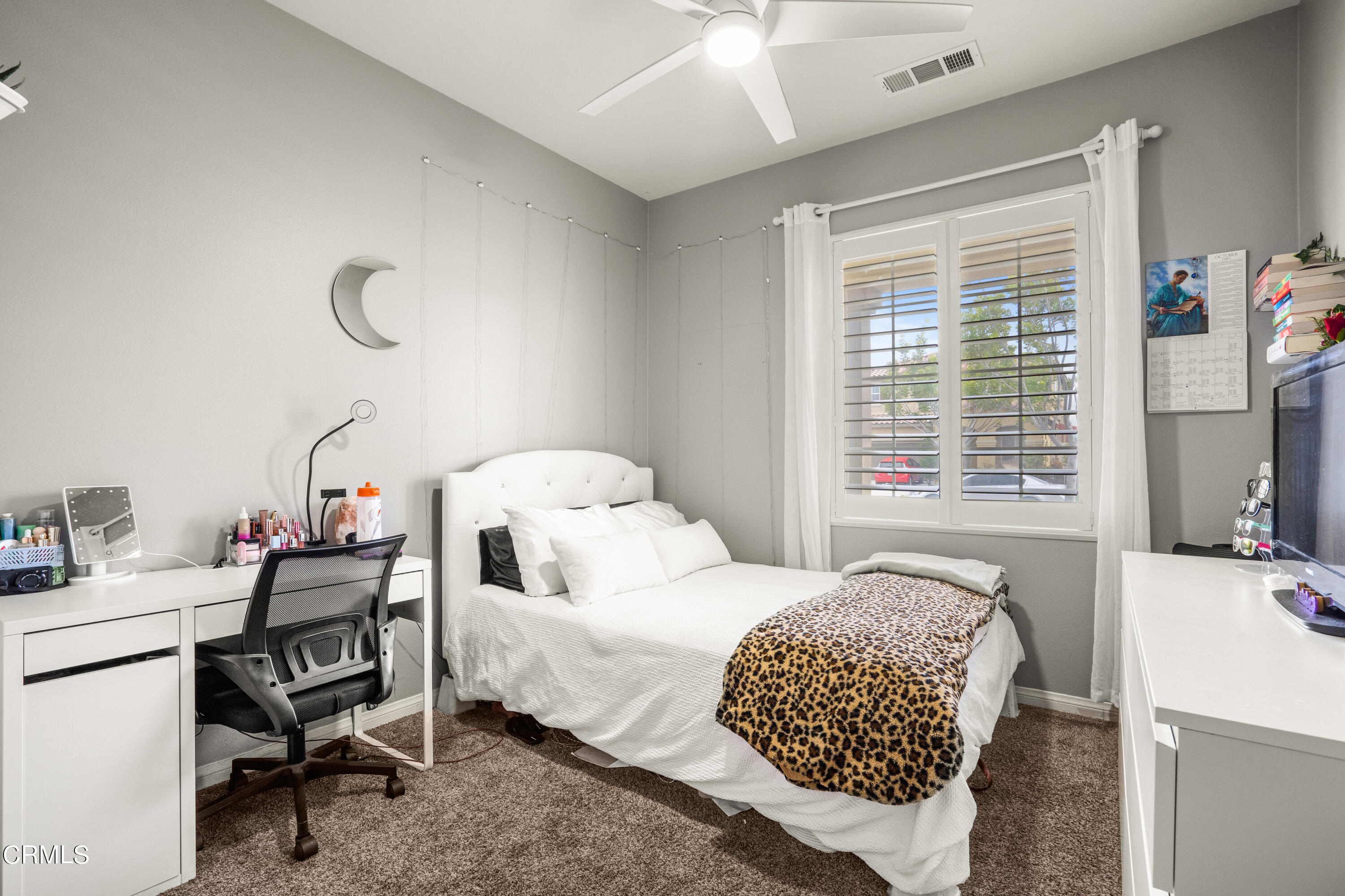 652 Xanadu Way Oxnard, CA 93036 - Photo 51 of 68 a bedroom with a bed and a table