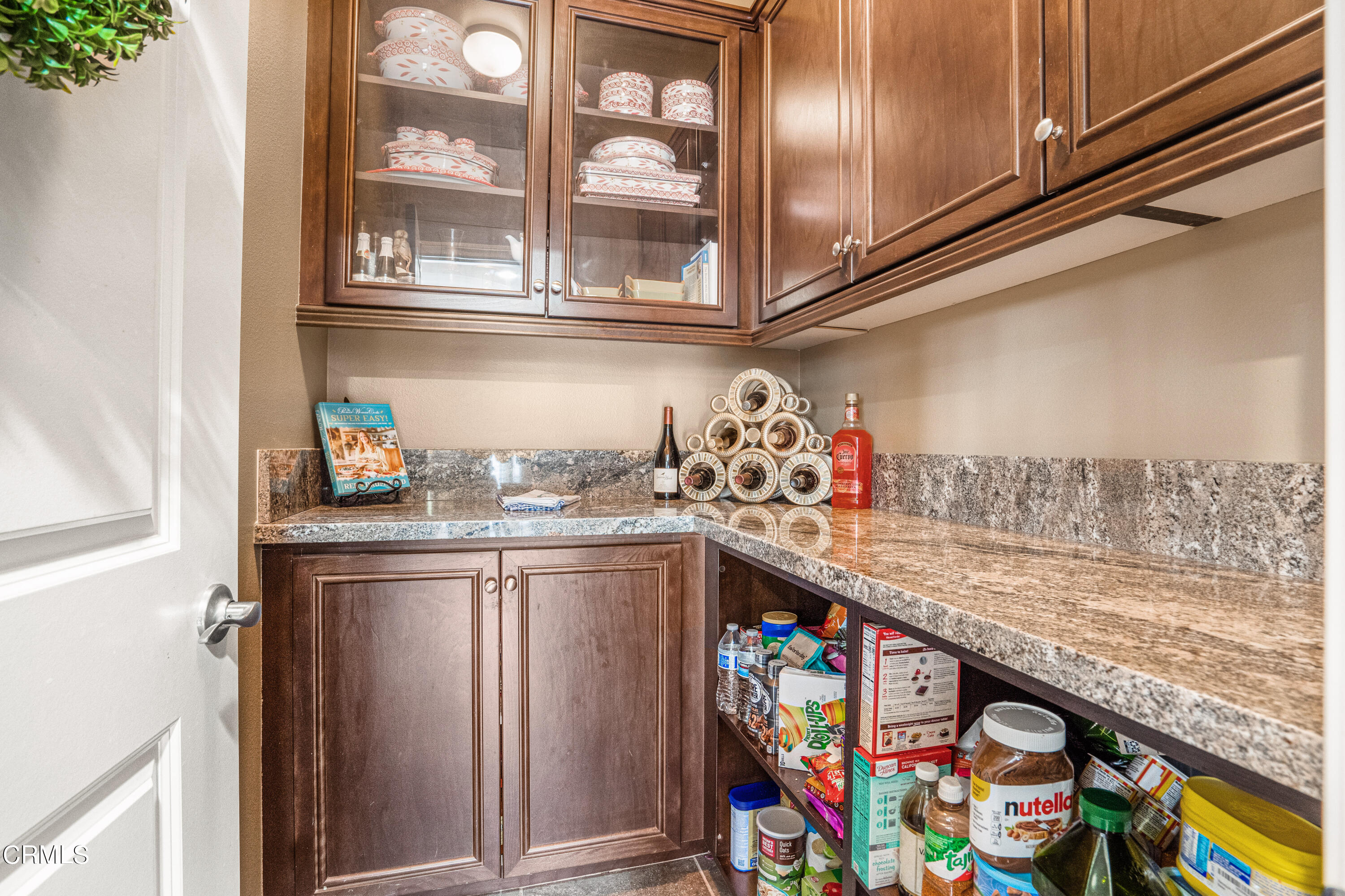 652 Xanadu Way Oxnard, CA 93036 - Photo 57 of 68 a kitchen with stainless steel appliances granite countertop a lot of stuff