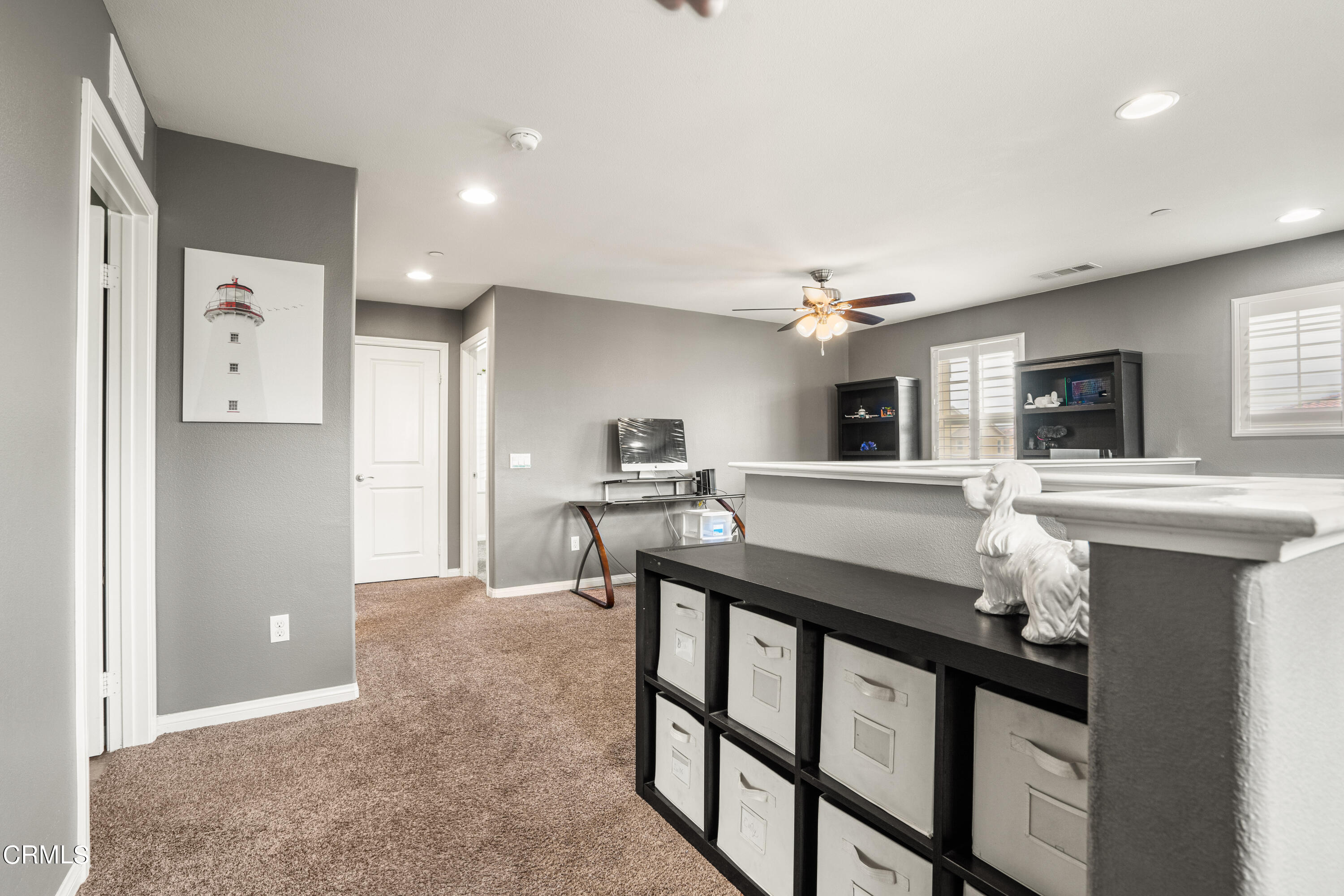652 Xanadu Way Oxnard, CA 93036 - Photo 58 of 68 a kitchen with granite countertop a sink cabinets and stainless steel appliances