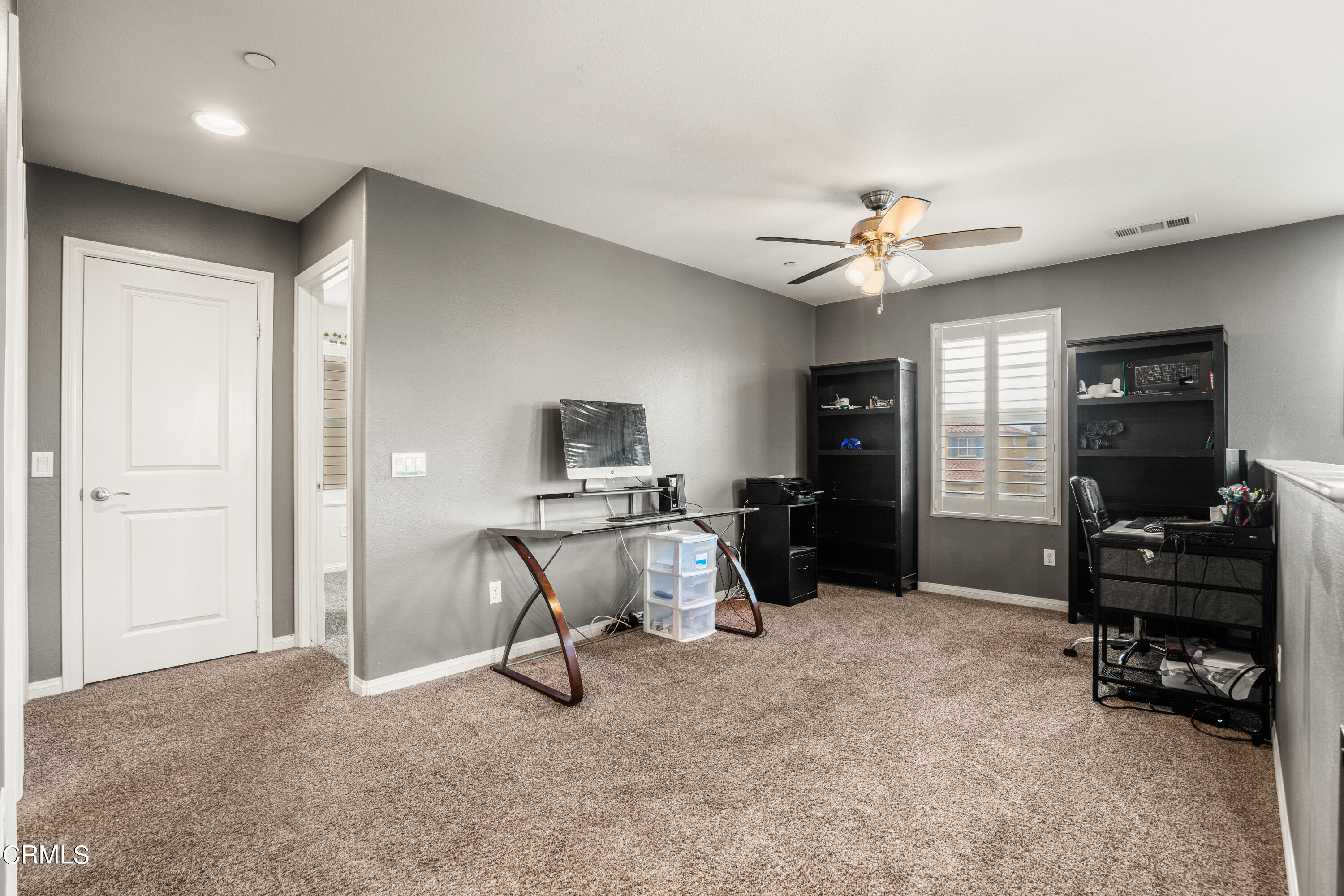 652 Xanadu Way Oxnard, CA 93036 - Photo 59 of 68 a view of a livingroom with furniture and a flat screen tv