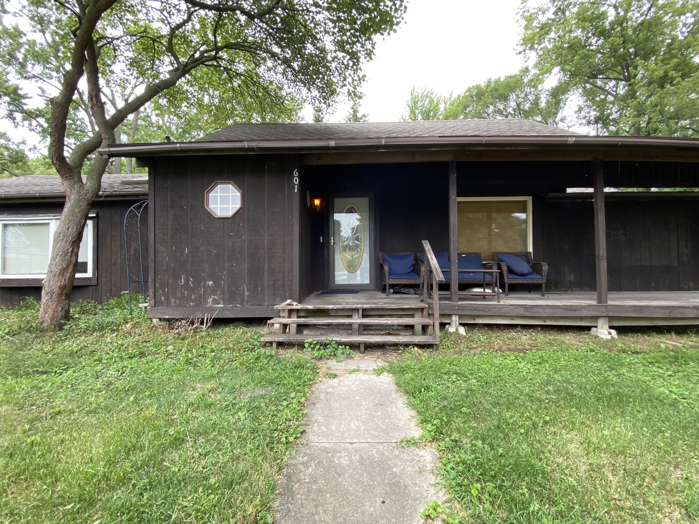 601 East Plumb Street Ransom, IL 60470 - Photo 1 of 21 a view of a chair and table in back yard of the house