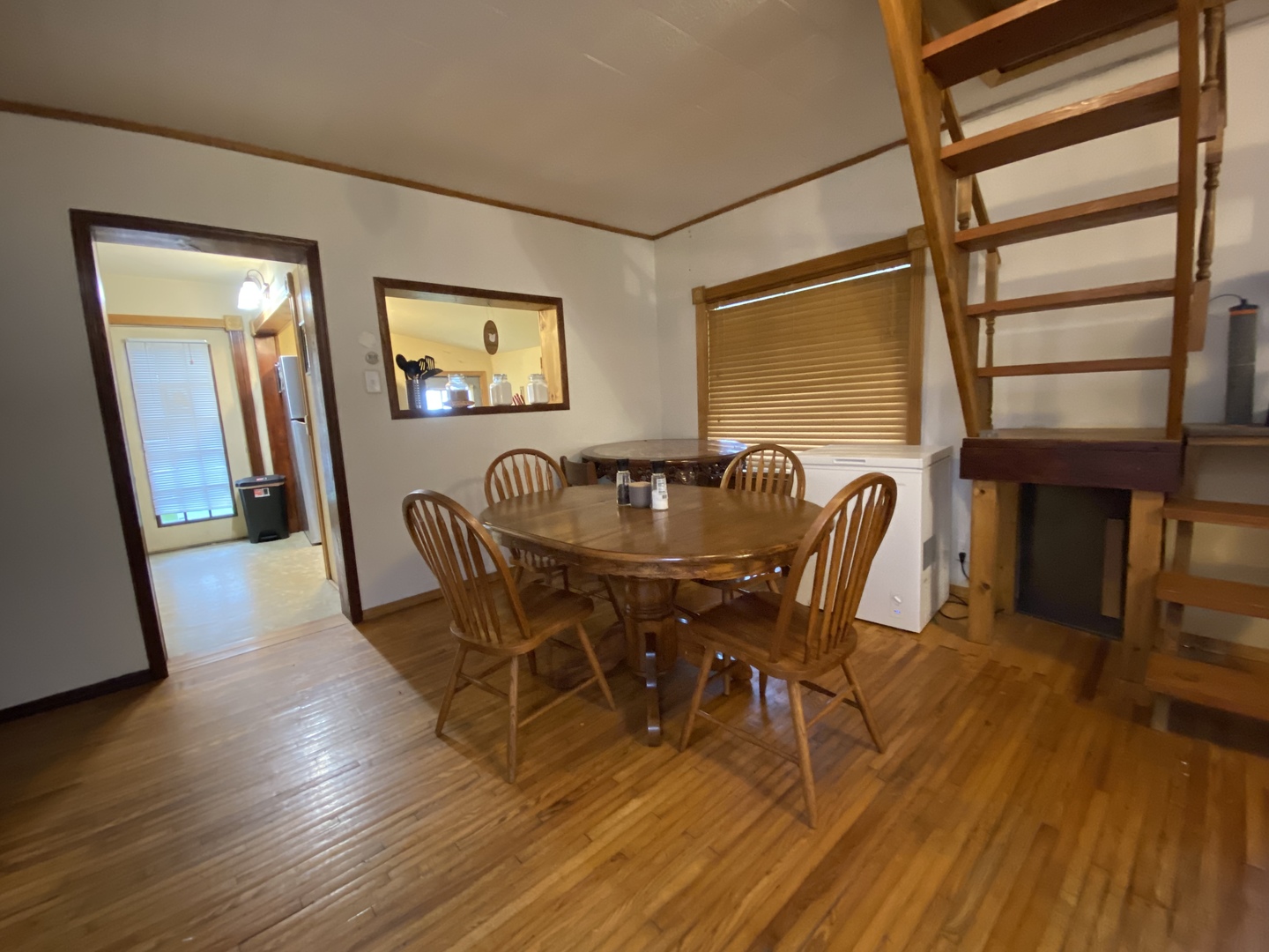 601 East Plumb Street Ransom, IL 60470 - Photo 3 of 21 a view of a dining room with furniture and wooden floor