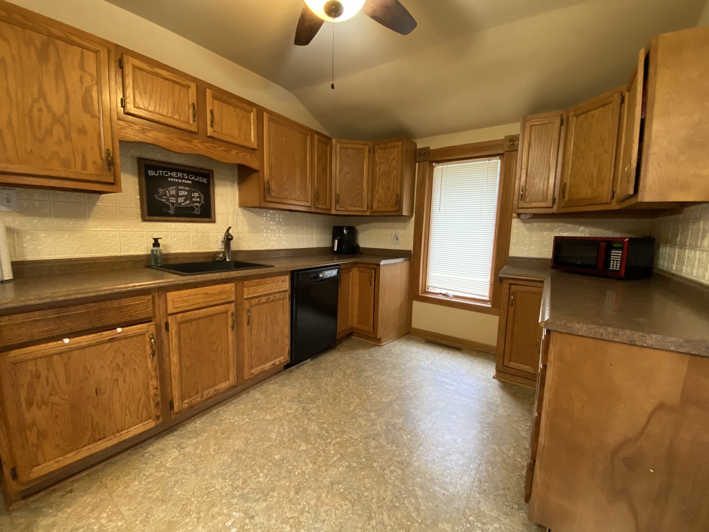 601 East Plumb Street Ransom, IL 60470 - Photo 4 of 21 a kitchen with stainless steel appliances granite countertop sink stove refrigerator and cabinets