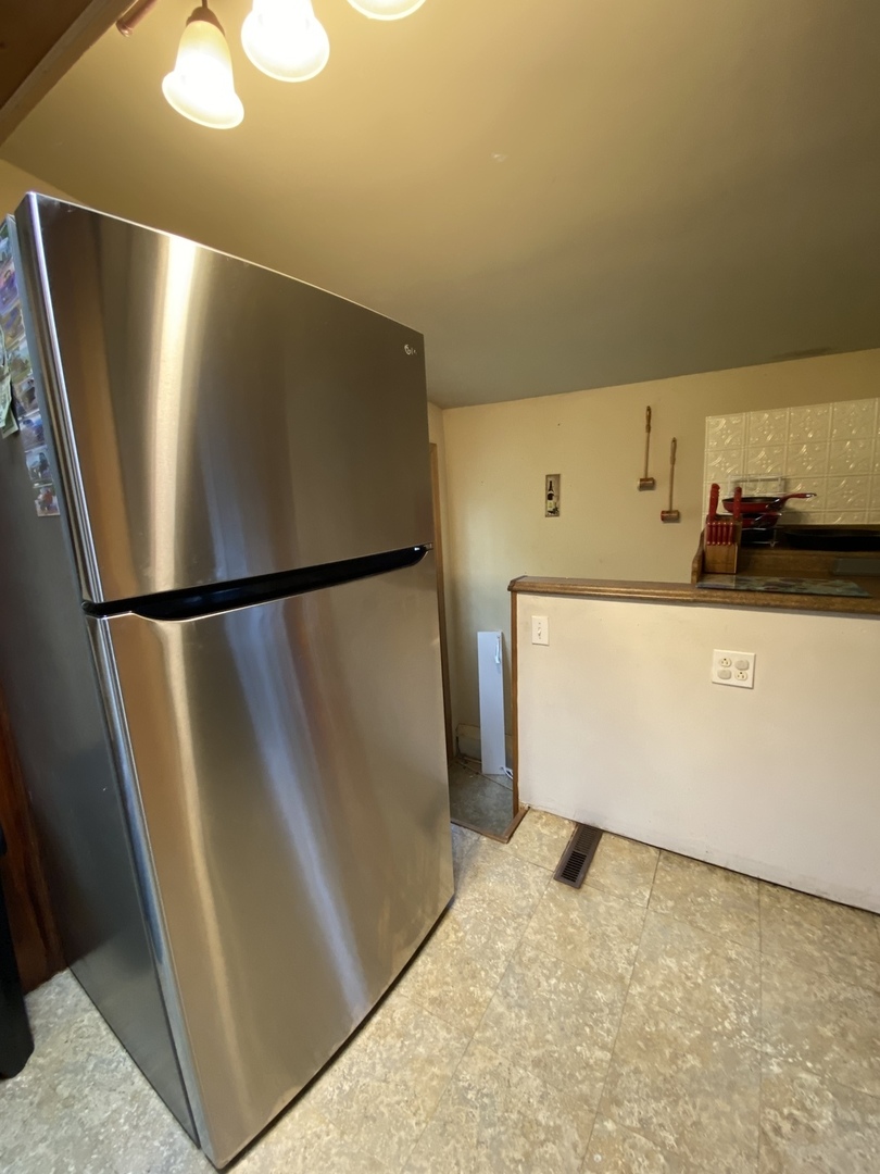 601 East Plumb Street Ransom, IL 60470 - Photo 7 of 21 a view of a refrigerator in kitchen