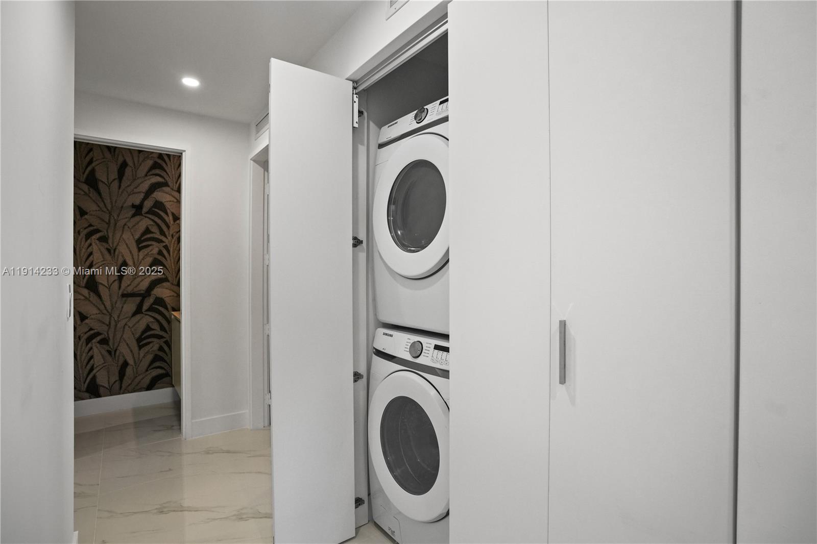 700 Northeast 24th Street, Unit 3905 Miami, FL 33137 - Photo 23 of 46 a utility room with dryer and washer