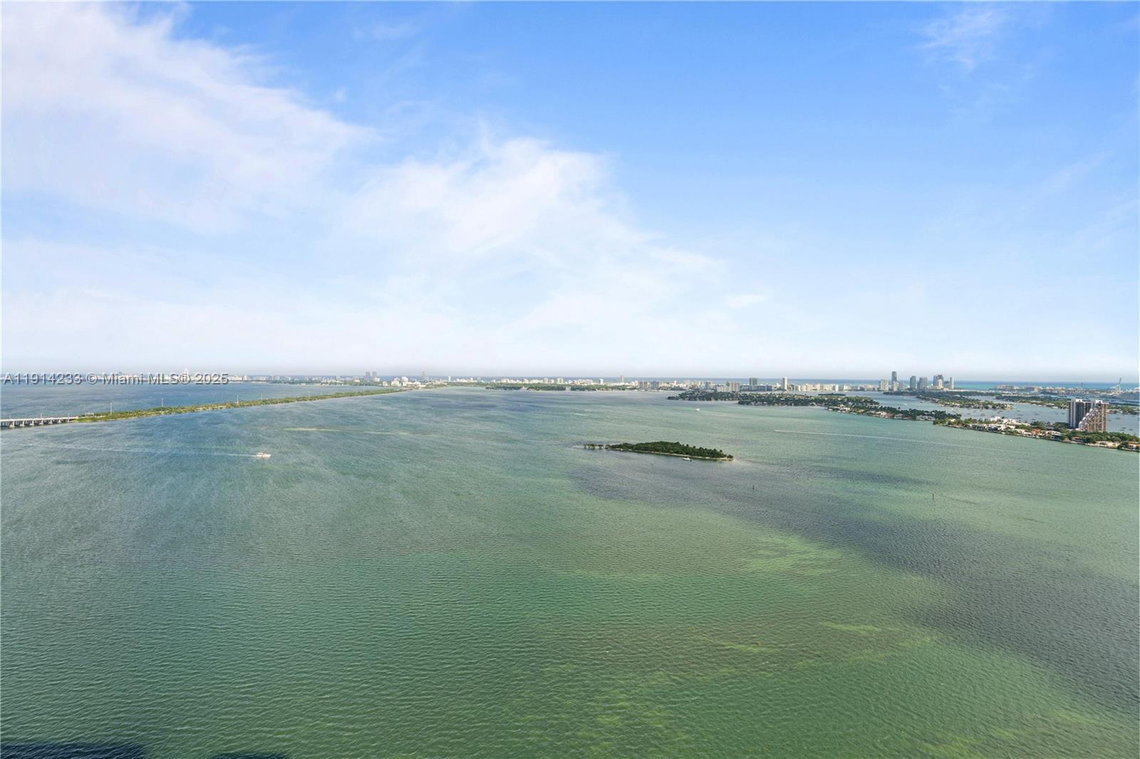 700 Northeast 24th Street, Unit 3905 Miami, FL 33137 - Photo 33 of 46 a view of lake with mountain