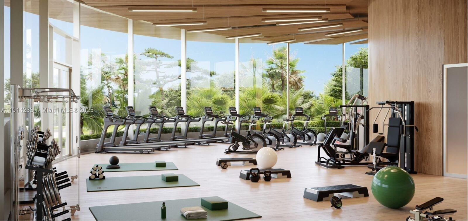 700 Northeast 24th Street, Unit 3905 Miami, FL 33137 - Photo 43 of 46 a view of a room with gym equipment