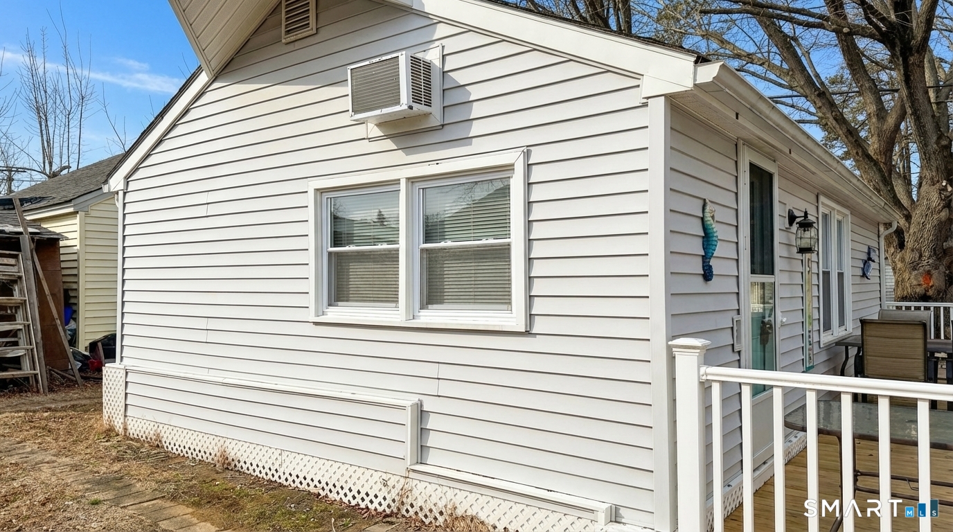 16 North Street Madison, CT 06443 - Photo 6 of 25 Side of cottage