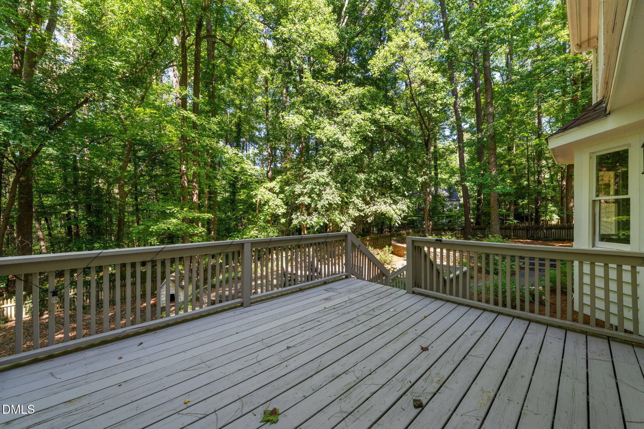 18 Strawberry Ridge Lane Durham, NC 27713 - Photo 39 of 59 a view of balcony with wooden floor and fence
