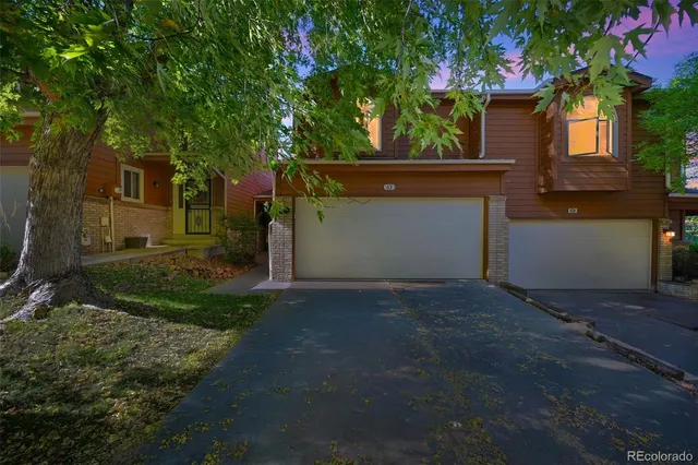 front view of a house with a street