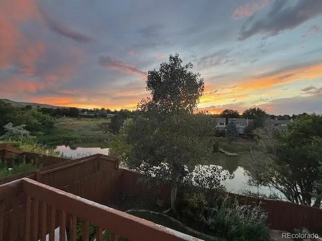 a view of a lake from a balcony