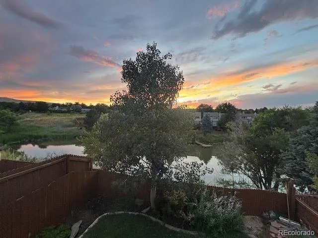 a view of a lake with a garden