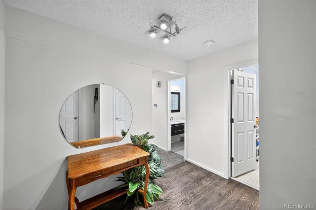 a room with furniture and wooden floor