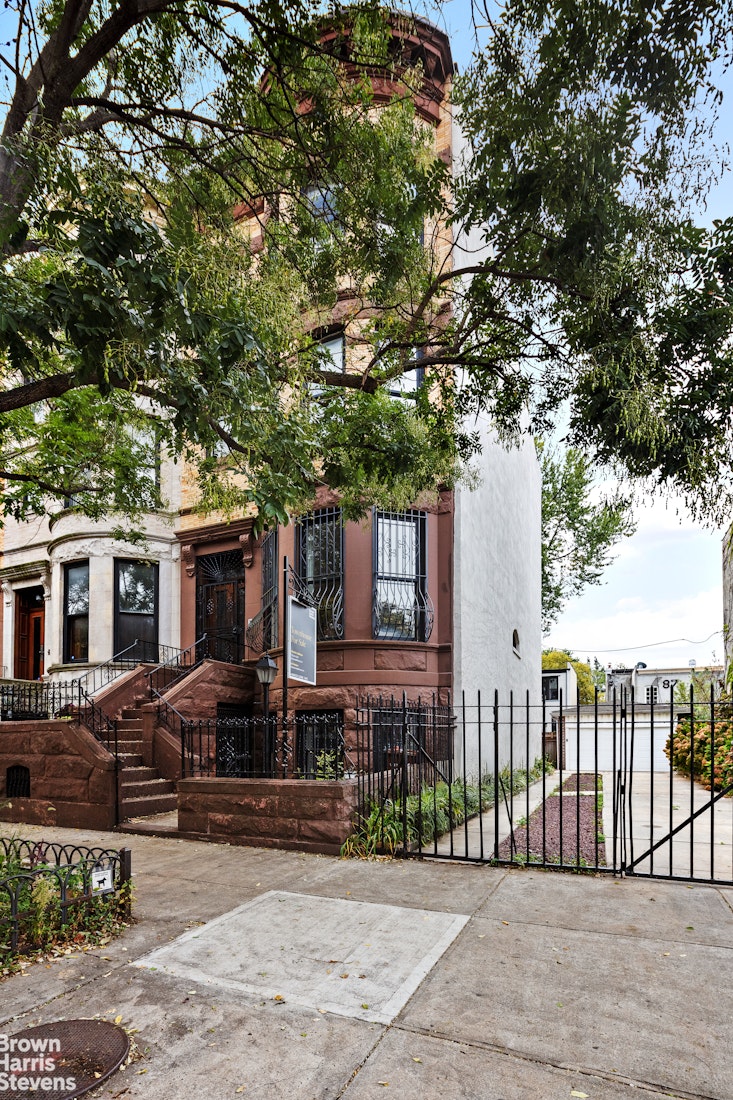 36 Rutland Road Brooklyn, NY 11225 - Photo 12 of 16 a front view of a house with a tree