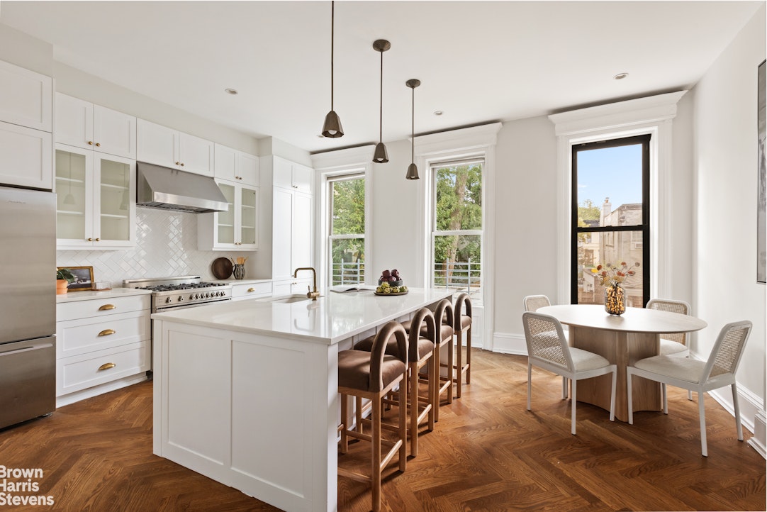 36 Rutland Road Brooklyn, NY 11225 - Photo 3 of 16 a kitchen with white cabinets and sink