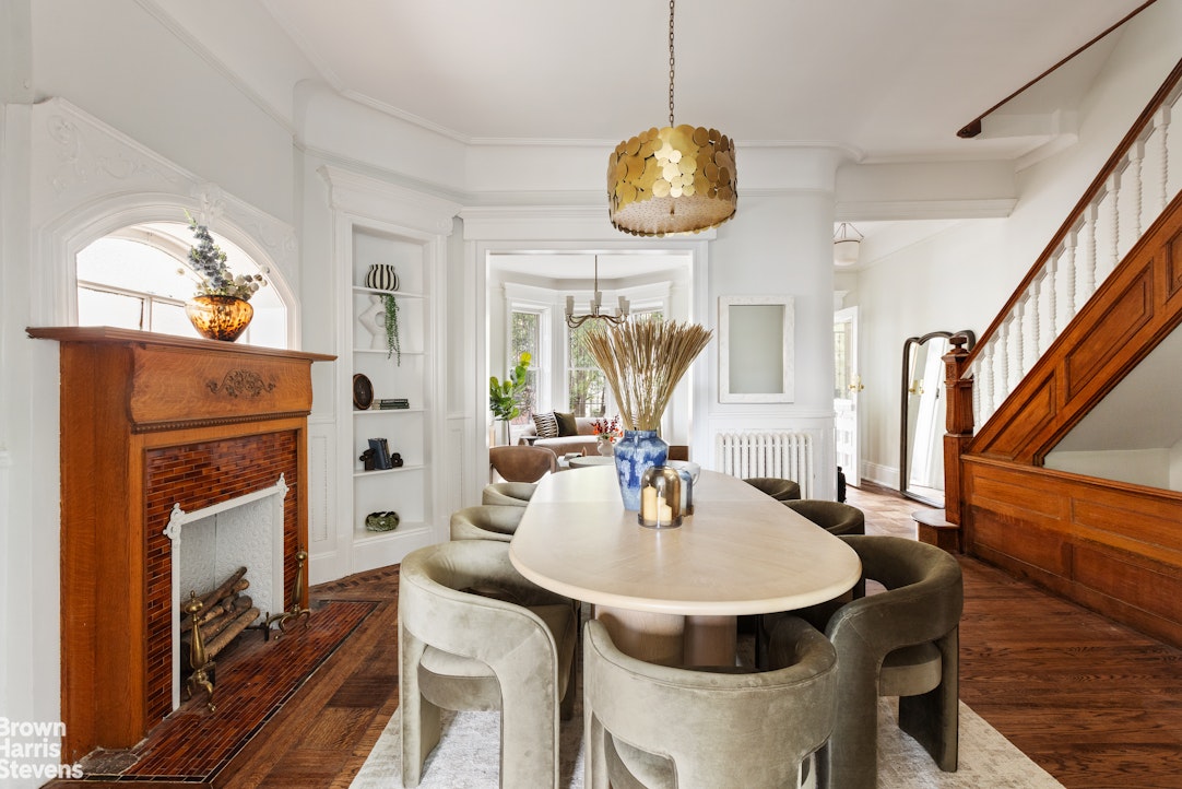 36 Rutland Road Brooklyn, NY 11225 - Photo 5 of 16 a view of a dining room with furniture a chandelier and wooden floor