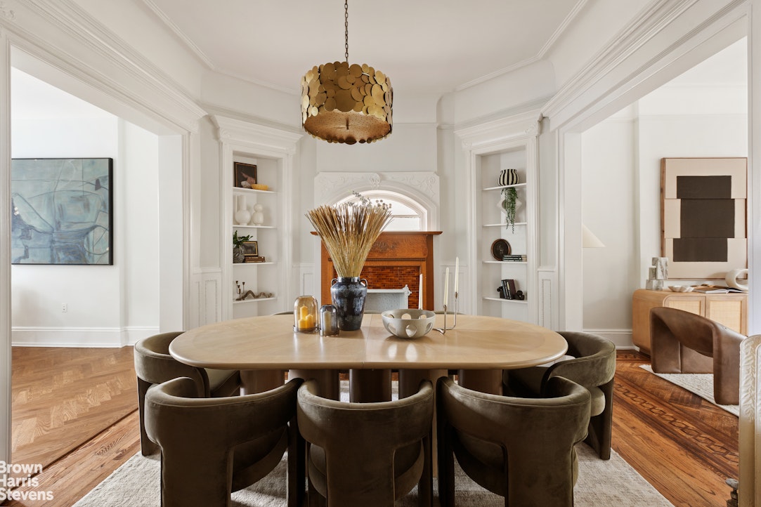 36 Rutland Road Brooklyn, NY 11225 - Photo 7 of 16 a view of a dining room with furniture a chandelier and wooden floor