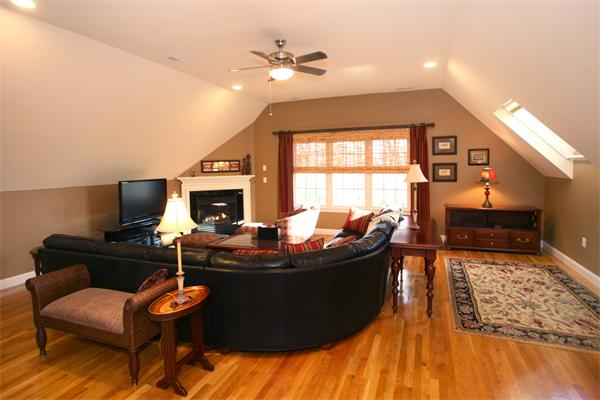 27 C Bayns Hill Road Boxford, MA 01921 - Photo 15 of 30 a living room with furniture and a fireplace