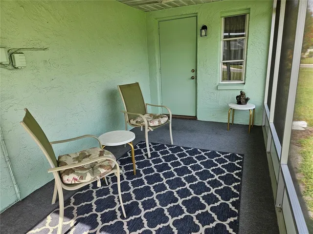 a bedroom with a bed and a dresser in it