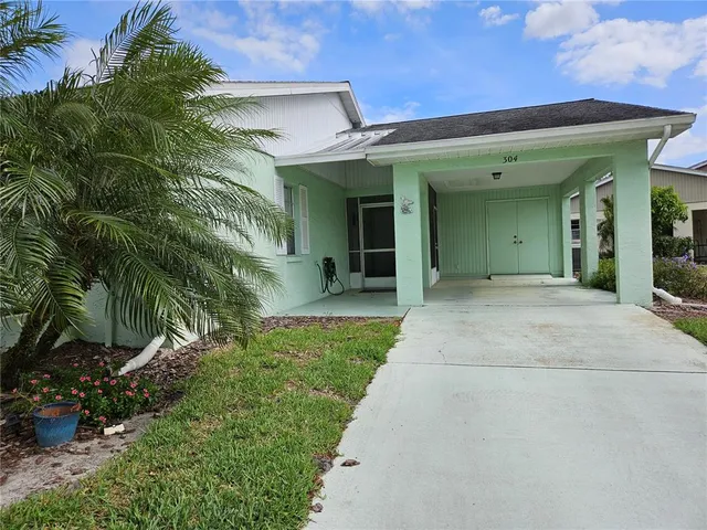 a view of a house with a garden