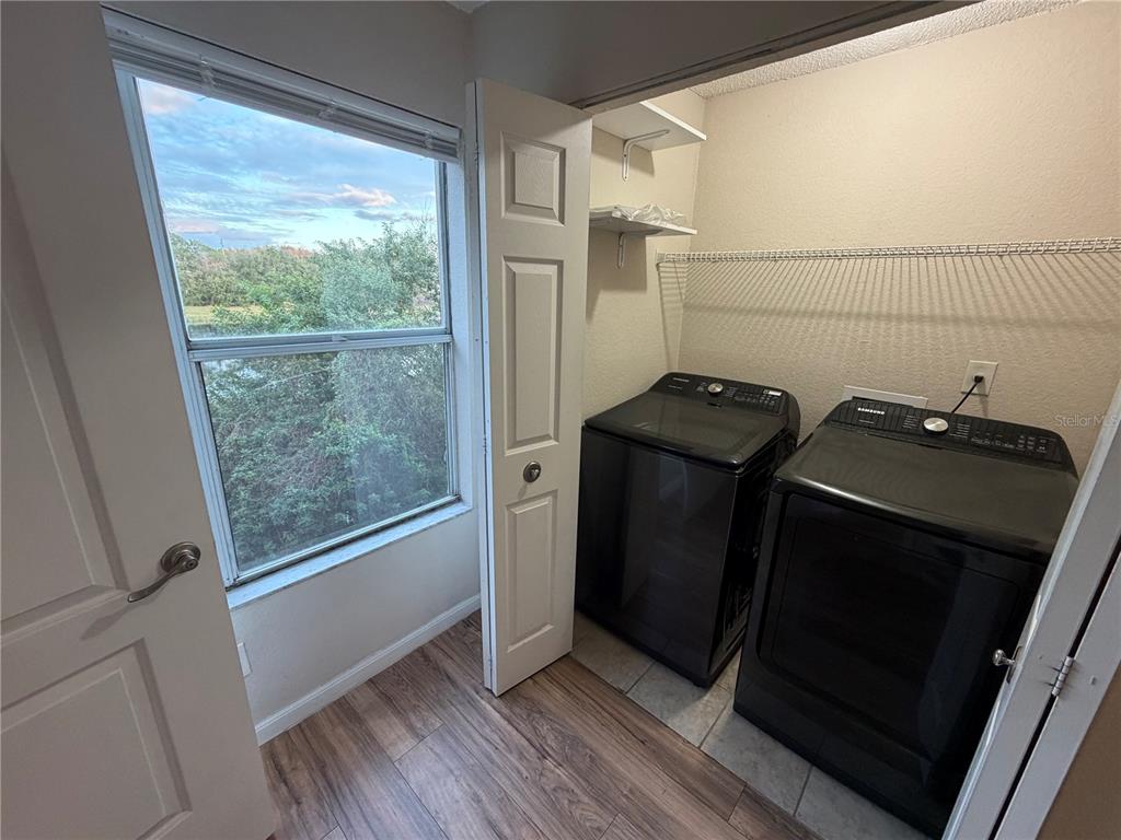 5128 Conroy Road, Unit 25 Orlando, FL 32811 - Photo 12 of 24 a view of a storage and utility room with a window