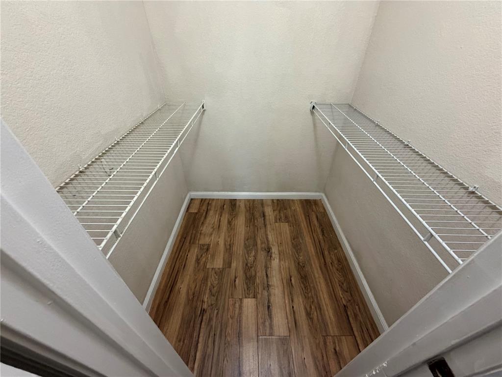 5128 Conroy Road, Unit 25 Orlando, FL 32811 - Photo 14 of 24 a view of wooden floor
