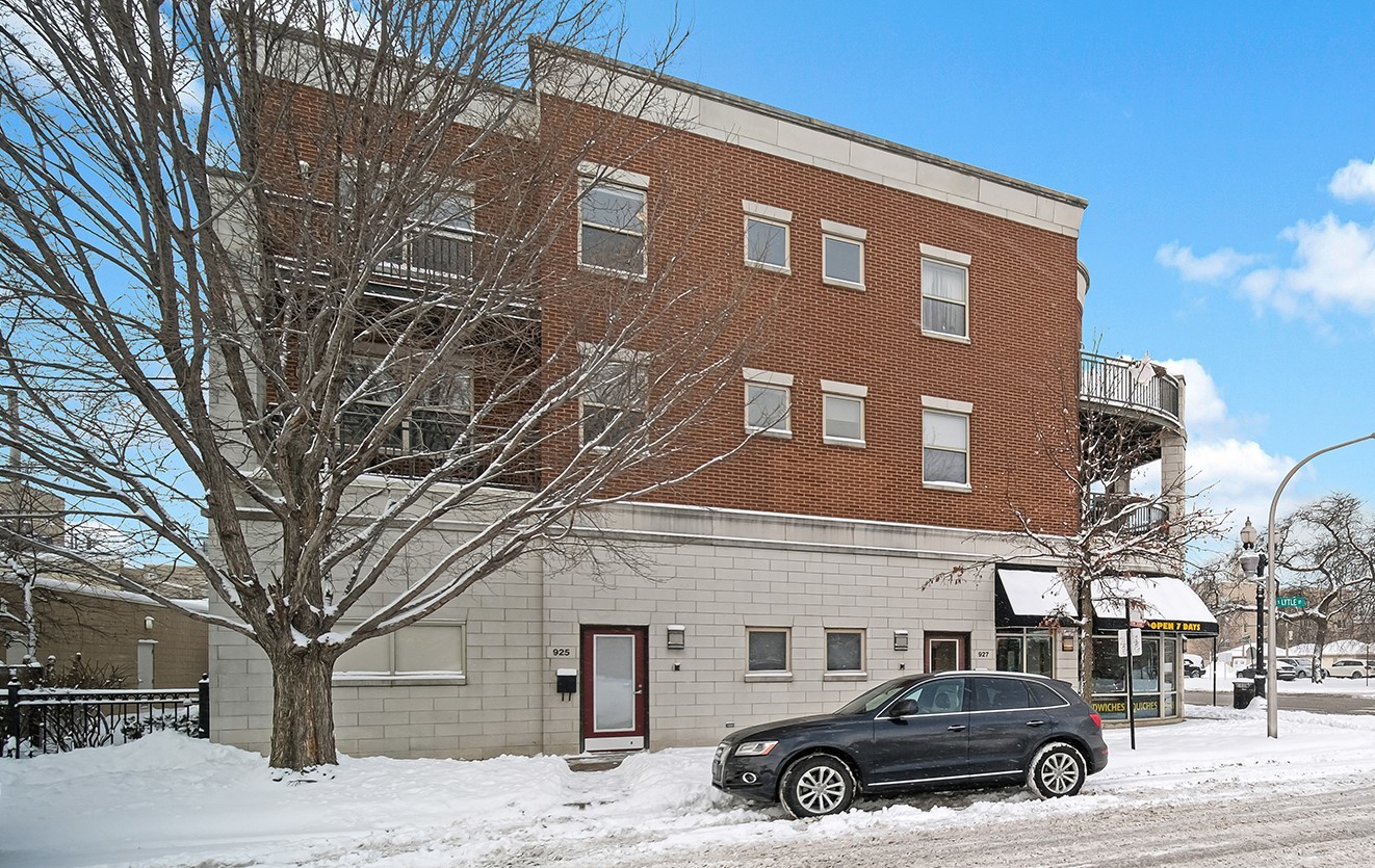 a car parked in front of a building